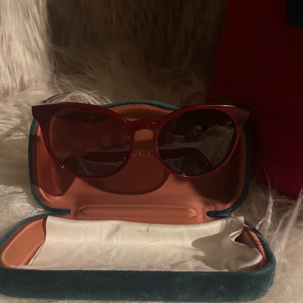 Gucci burgundy sunglasses almost new condition no scratches .